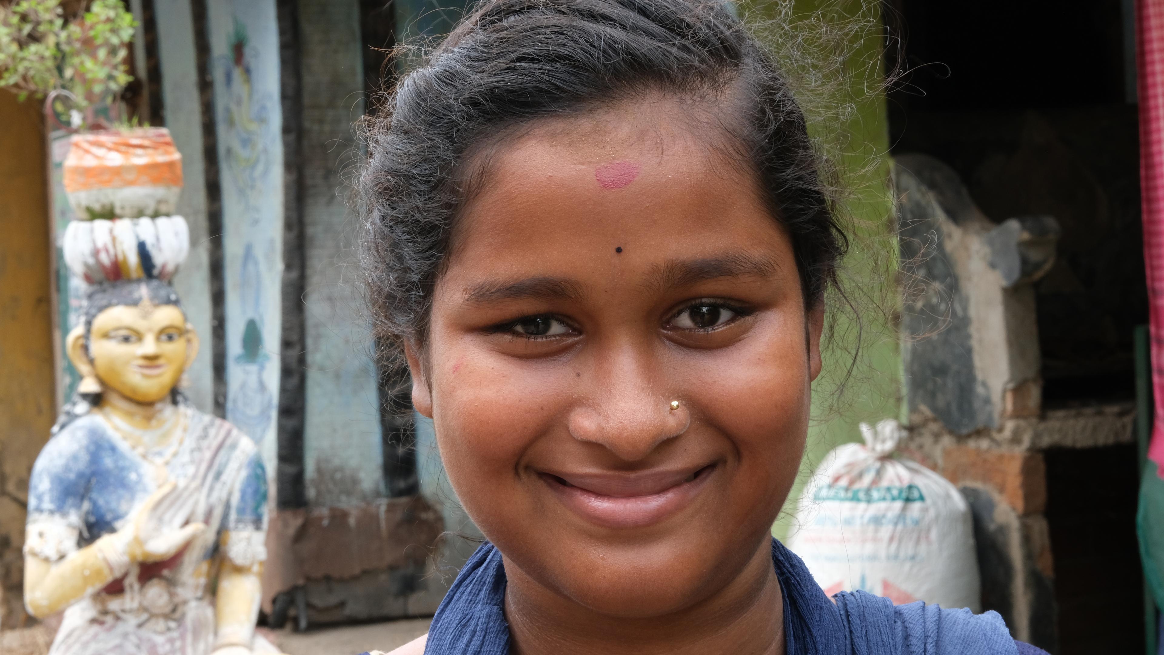 Young woman from India, smiling