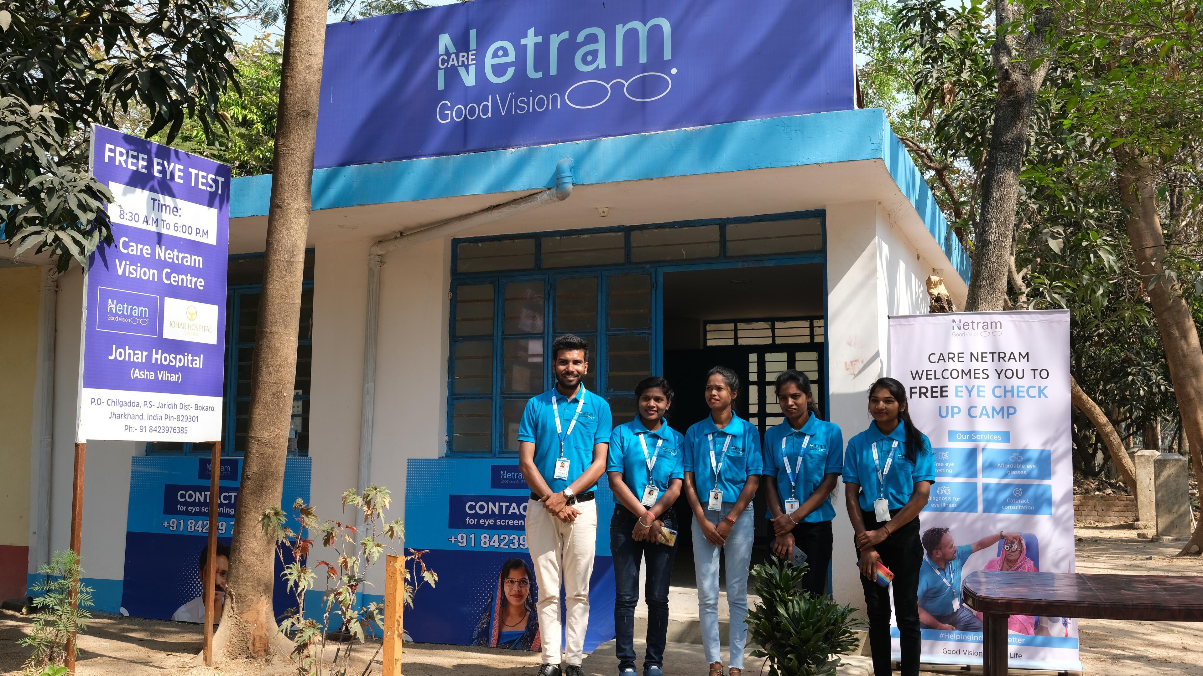 Care Netram team stands in front of Vision Center