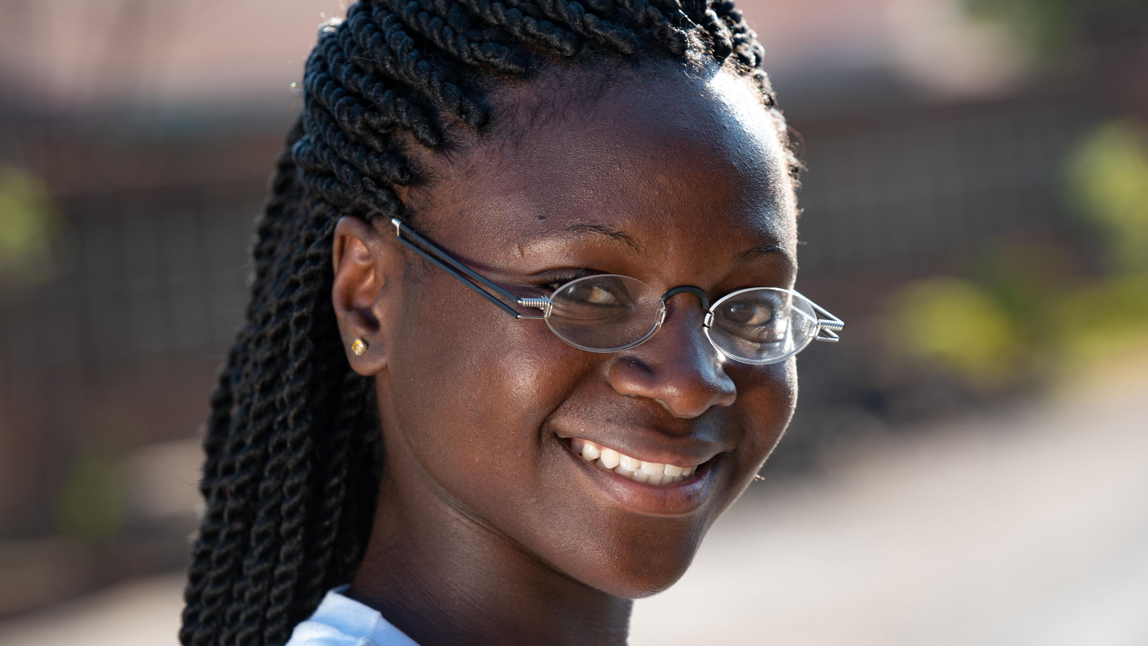 Malawian girl with OneDollarGlasses with double temples